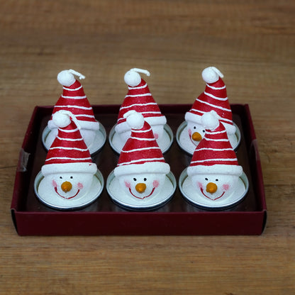 Sechs Schneemann-Teelichter mit roter Mütze als festliche Winterdeko