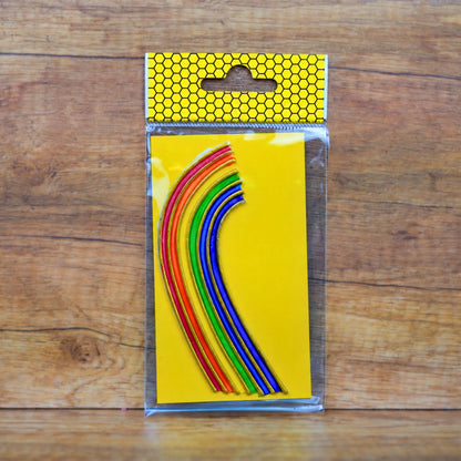 Buntes Wachsdekor Regenbogen mit Goldkontur, ca. 16 cm, auf Trägerpapier in der Verpackung